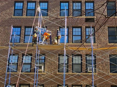 Scaffolding on adjoining NYC properties subject to RPAPL § 881 access agreements.